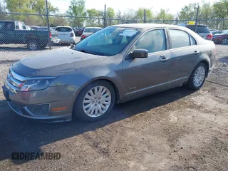 2010 Ford Fusion Hybrid with VIN 3FADP0L30AR376210, listed as a IAAI auction lot 42110727 with 108,897 mi miles. Bid and sale history available at carsss.com. Image 2.