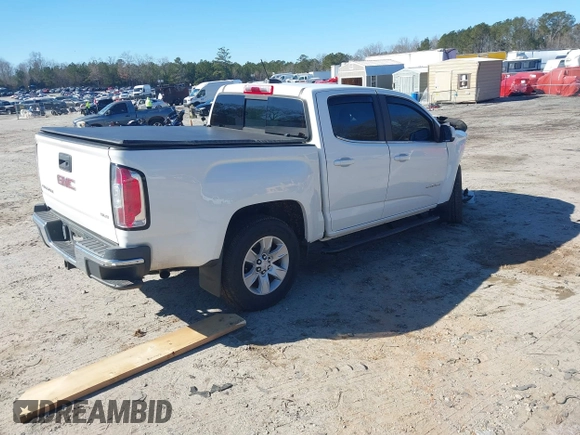 2015 GMC Canyon 2WD SLE with VIN 1GTG5BE32F1254150, listed as a IAAI auction lot 41380439 with 129,098 mi miles. Bid and sale history available at carsss.com. Image 4.
