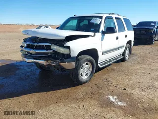2004 Chevrolet Tahoe LT with VIN 1GNEC13Z44R323201, listed as a IAAI auction lot 41481138 with 216,869 mi miles. Bid and sale history available at carsss.com. Image 2.