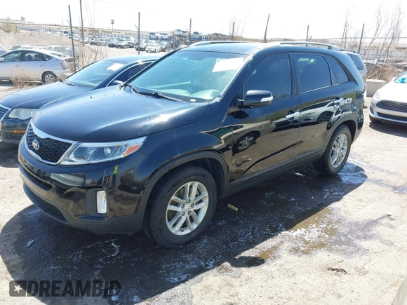2015 Kia Sorento LX with VIN 5XYKT4A79FG586350, listed as a IAAI auction lot 42024191 with 144,550 mi miles. Bid and sale history available at carsss.com. Image 2.