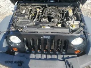 2013 Jeep Wrangler Unlimited Sport with VIN 1C4BJWDG8DL631518, listed as a Copart auction lot 62107765 with 132,617 mi miles and Clean title. Bid and sale history available at DreamBid. Image 12.