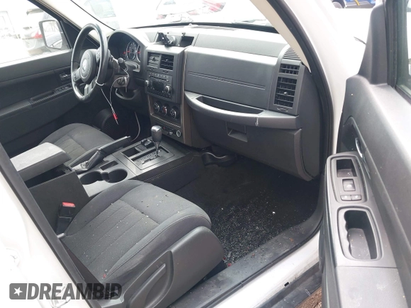 2012 Jeep Liberty Sport with VIN 1C4PJMAKXCW100451, listed as a IAAI auction lot 41987230 with 83,904 mi miles and . Bid and sale history available at DreamBid. Image 5.