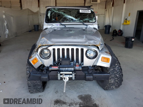 2006 Jeep Wrangler Rubicon with VIN 1J4FA69S26P734731, listed as a Copart auction lot 52009295 with 117,872 mi miles and Salvage title. Bid and sale history available at DreamBid. Image 5.