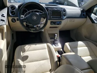 2012 Volkswagen Tiguan SEL with VIN WVGAV7AXXCW521394, listed as a Copart auction lot 53000555 with 126,017 mi miles and Salvage Title. Bid and sale history available at DreamBid. Image 8.