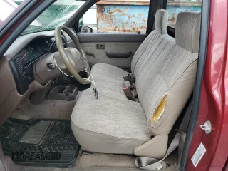 1999 Toyota Tacoma z VIN 4TANL42N4XZ435246, wystawiony jako Copart lot #56843025 z przebiegiem 197 295 mil mil oraz Szkoda całkowita • Salvage title. Historia ofert i sprzedaży dostępna na DreamBid. Obrazek 7.