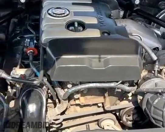 2014 Cadillac ATS Standard AWD z VIN 1G6AG5RX4E0109116, wystawiony jako Copart lot #58604795 z przebiegiem 169 817 mil mil oraz Szkoda całkowita • Salvage title. Historia ofert i sprzedaży dostępna na DreamBid. Obrazek 7.