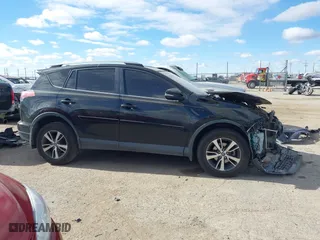 2017 Toyota RAV4 XLE with VIN 2T3RFREV9HW567801, listed as a IAAI auction lot 41053316 with 103,267 mi miles. Bid and sale history available at carsss.com. Image 14.
