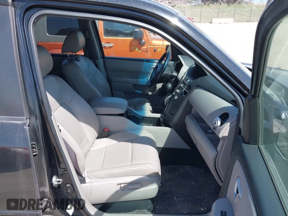 2012 Honda Pilot EX-L with VIN 5FNYF4H52CB085308, listed as a IAAI auction lot 41987301 with 180,877 mi miles and . Bid and sale history available at DreamBid. Image 5.