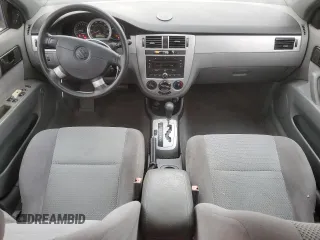 2006 Suzuki Forenza z VIN KL5JD56ZX6K372427, wystawiony jako Copart lot #80627544 z przebiegiem 94 493 mil mil oraz Tytuł czysty. Historia ofert i sprzedaży dostępna na DreamBid. Obrazek 8.