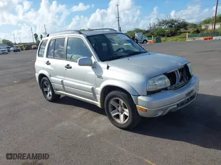 2003 Suzuki Grand Vitara with VIN JS3TE62VX34101622, listed as a IAAI auction lot 41689760 with 152,104 mi miles. Bid and sale history available at carsss.com. Image 1.