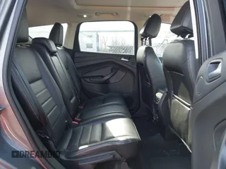 2013 Ford Escape SEL with VIN 1FMCU9H92DUA24934, listed as a IAAI auction lot 41832566 with 124,705 mi miles. Bid and sale history available at carsss.com. Image 8.