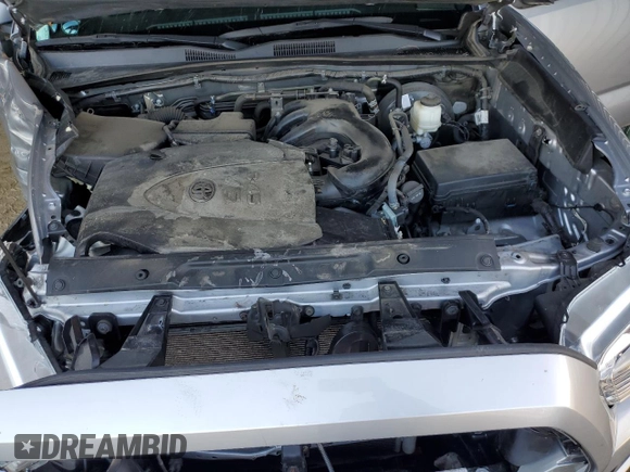 2021 Toyota Tacoma SR with VIN 3TMCZ5AN6MM393306, listed as a Copart auction lot 41483325 with 57,217 mi miles and Salvage title. Bid and sale history available at DreamBid. Image 11.