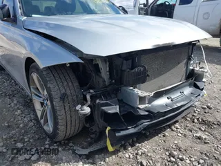2015 BMW 3 Series 328i with VIN WBA3A5C55FF609490, listed as a IAAI auction lot 42006008 with 110,239 mi miles. Bid and sale history available at carsss.com. Image 17.