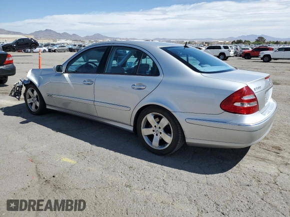 2003 Mercedes-Benz E-Class 5.0L with VIN WDBUF70J63A189963, listed as a Copart auction lot 50898675 with 130,264 mi miles and Salvage Title. Bid and sale history available at carsss.com. Image 2.