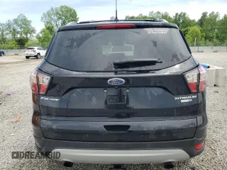 2018 Ford Escape Titanium with VIN 1FMCU9J93JUB80907, listed as a Copart auction lot 55932275 with 102,295 mi miles and Salvage title. Bid and sale history available at DreamBid. Image 6.