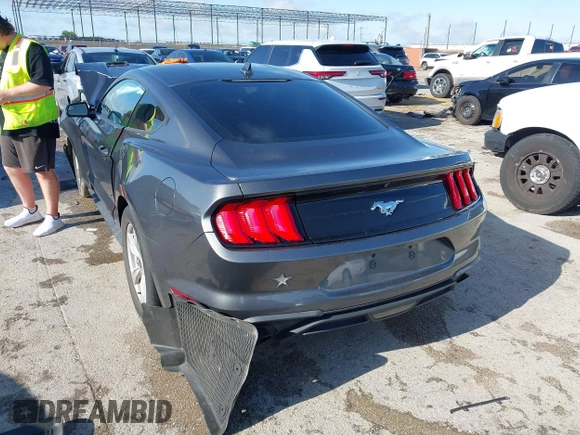 2020 Ford Mustang EcoBoost with VIN 1FA6P8TH3L5169920, listed as a IAAI auction lot 42339107 with 84,748 mi miles and . Bid and sale history available at DreamBid. Image 3.