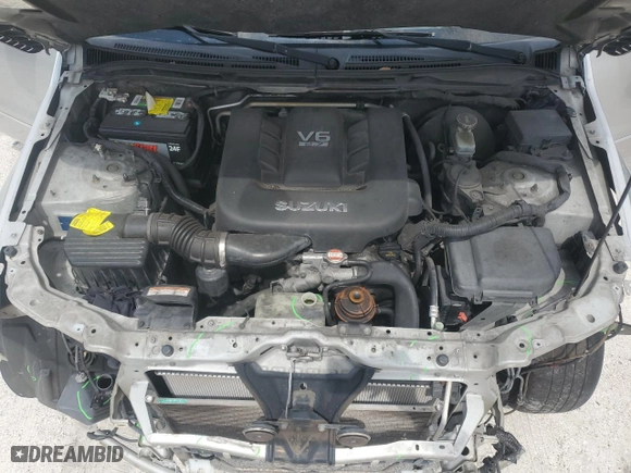 2006 Suzuki Grand Vitara Luxury with VIN JS3TE947264102168, listed as a Copart auction lot 71726254 with 276,789 mi miles and Salvage Title. Bid and sale history available at carsss.com. Image 12.