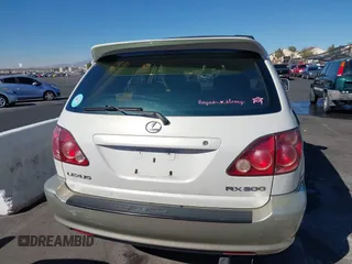 1999 Lexus RX 300 z VIN JT6GF10U9X0015877, wystawiony jako IAAI lot #41666610 z przebiegiem Nie podano mil oraz . Historia ofert i sprzedaży dostępna na DreamBid. Obrazek 6.