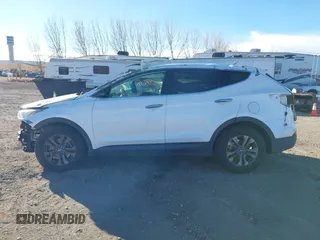 2013 Hyundai Santa Fe Sport z VIN 5XYZT3LB2DG021803, wystawiony jako IAAI lot #41195838 z przebiegiem Nie podano mil oraz . Historia ofert i sprzedaży dostępna na DreamBid. Obrazek 14.