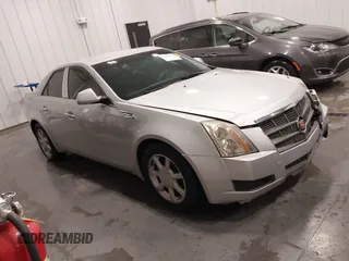 2009 Cadillac CTS RWD w/1SA with VIN 1G6DF577790113198, listed as a IAAI auction lot 41547714 with 140,762 mi miles. Bid and sale history available at carsss.com. Image 1.