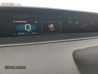 2021 Toyota Prius L Eco with VIN JTDKAMFU4M3136370, listed as a Copart auction lot 53513905 with 63,165 mi miles and Salvage title. Bid and sale history available at DreamBid. Image 9.