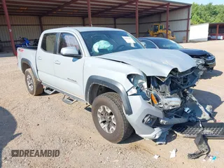 2019 Toyota Tacoma SR with VIN 3TMCZ5AN6KM265130, listed as a IAAI auction lot 39829802 with 134,171 mi miles and . Bid and sale history available at DreamBid. Image 1.