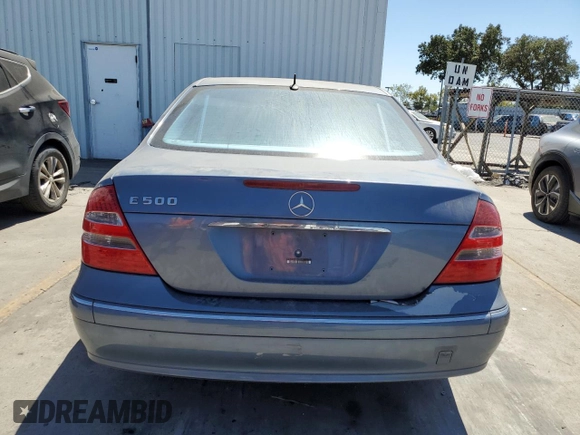 2004 Mercedes-Benz E-Class 5.0L with VIN WDBUF70JX4A479530, listed as a Copart auction lot 68093214 with 165,986 mi miles and Clean Title. Bid and sale history available at carsss.com. Image 6.