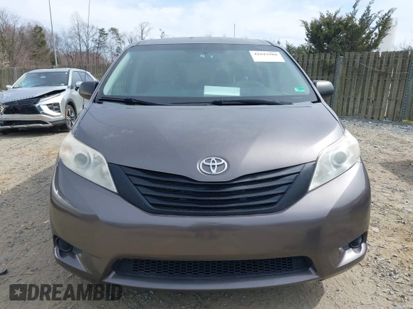 2012 Toyota Sienna with VIN 5TDKA3DC9CS011298, listed as a IAAI auction lot 41843980 with 158,787 mi miles and . Bid and sale history available at DreamBid. Image 13.