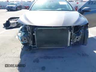 2019 Toyota Camry LE with VIN 4T1B11HK2KU240465, listed as a IAAI auction lot 42095075 with 67,852 mi miles and . Bid and sale history available at DreamBid. Image 6.