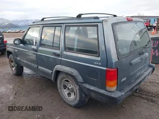 1997 Jeep Cherokee Sport with VIN 1J4FJ68S9VL607515, listed as a IAAI auction lot 41216502 with 238,274 mi miles. Bid and sale history available at carsss.com. Image 3.