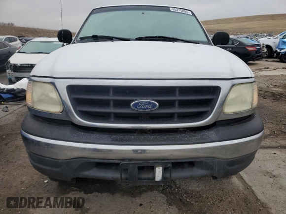 2000 Ford F-150 with VIN 1FTRF18W8YKA60791, listed as a Copart auction lot 45215895 with 157,885 mi miles and Clean title. Bid and sale history available at DreamBid. Image 5.