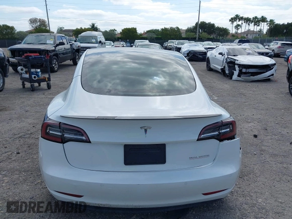2021 Tesla Model 3 Performance z VIN 5YJ3E1EC5MF984891, wystawiony jako IAAI lot #42071151 z przebiegiem 72 883 mil mil oraz . Historia ofert i sprzedaży dostępna na DreamBid. Obrazek 16.