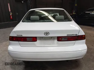 1999 Toyota Camry LE z VIN 4T1BG22K1XU888402, wystawiony jako IAAI lot #42483791 z przebiegiem 149 512 mil mil oraz . Historia ofert i sprzedaży dostępna na DreamBid. Obrazek 16.