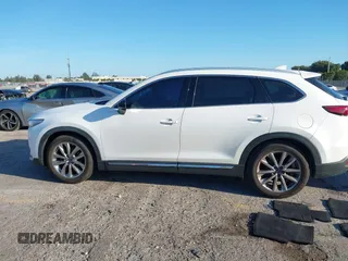 2019 Mazda CX-9 Grand Touring with VIN JM3TCADY3K0305173, listed as a IAAI auction lot 41672448 with 132,265 mi miles. Bid and sale history available at carsss.com. Image 14.