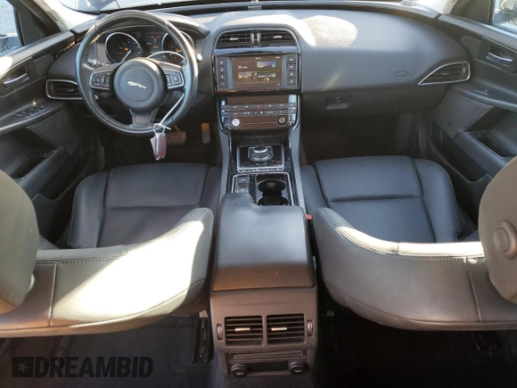 2018 Jaguar XE 25t with VIN SAJAR4FX6JCP27215, listed as a Copart auction lot 88518935 with 75,559 mi miles and Salvage Title. Bid and sale history available at carsss.com. Image 8.