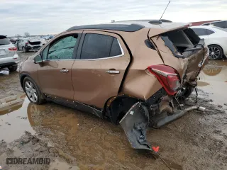 2017 Buick Encore Premium with VIN KL4CJDSB0HB121878, listed as a Copart auction lot 46696375 with 0 mi miles and Salvage Title. Bid and sale history available at carsss.com. Image 2.