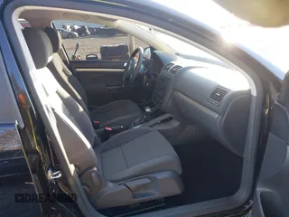 2009 Volkswagen Rabbit S with VIN WVWDB71K19W006730, listed as a IAAI auction lot 41546917 with 108,780 mi miles. Bid and sale history available at carsss.com. Image 5.