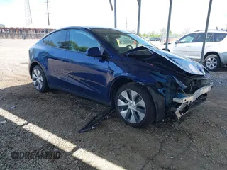 2022 Tesla Model Y Long Range z VIN 7SAYGDEE2NF306932, wystawiony jako IAAI lot #42167874 z przebiegiem 58 478 mil mil oraz . Historia ofert i sprzedaży dostępna na DreamBid. Obrazek 1.