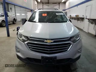 2020 Chevrolet Equinox Premier z VIN 2GNAXXEV3L6128099, wystawiony jako Copart lot #79041114 z przebiegiem 65 856 mil mil oraz Szkoda całkowita • Salvage title. Historia ofert i sprzedaży dostępna na DreamBid. Obrazek 5.