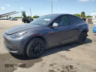 2023 Tesla Model Y Long Range z VIN 7SAYGDEE9PF748268, wystawiony jako Copart lot #58006495 z przebiegiem 43 141 mil mil oraz Szkoda całkowita • Salvage title. Historia ofert i sprzedaży dostępna na DreamBid. Obrazek 1.