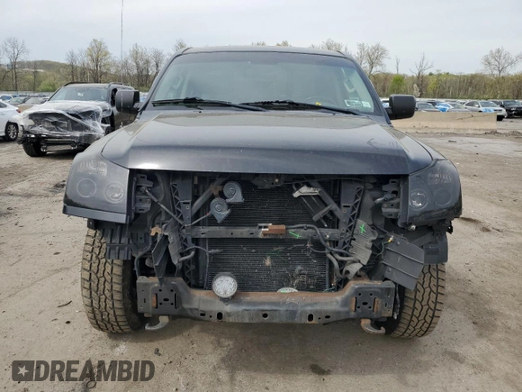 2012 Nissan Titan SV with VIN 1N6AA0EJ2CN311162, listed as a Copart auction lot 54403125 with 233,662 mi miles and Salvage title. Bid and sale history available at DreamBid. Image 5.