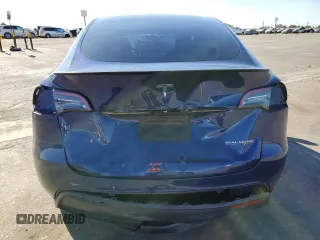 2021 Tesla Model Y Performance with VIN 5YJYGDEF0MF262336, listed as a Copart auction lot 60618534 with 29,242 mi miles and Salvage Title. Bid and sale history available at DreamBid. Image 6.