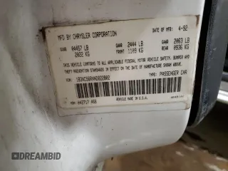 1992 Dodge Dynasty LE z VIN 1B3XC56RXND822802, wystawiony jako Copart lot #82799714 z przebiegiem 137 131 mil mil oraz Szkoda całkowita • Salvage title. Historia ofert i sprzedaży dostępna na DreamBid. Obrazek 12.