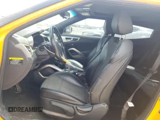 2016 Hyundai Veloster z VIN KMHTC6AD8GU278670, wystawiony jako Copart lot #57315695 z przebiegiem 89 496 mil mil oraz Szkoda całkowita • Salvage title. Historia ofert i sprzedaży dostępna na DreamBid. Obrazek 7.