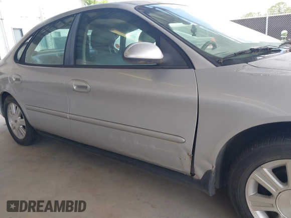 2005 Ford Taurus SEL with VIN 1FAFP56235A209879, listed as a IAAI auction lot 42537452 with 231,151 mi miles and . Bid and sale history available at DreamBid. Image 6.