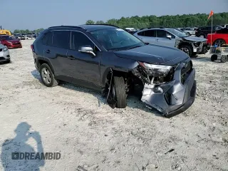 2022 Toyota RAV4 XLE with VIN 2T3W1RFV8NC210283, listed as a Copart auction lot 58776455 with 39,681 mi miles and Salvage title. Bid and sale history available at DreamBid. Image 14.