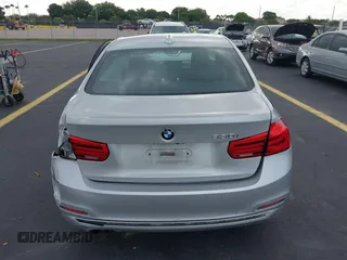 2017 BMW 3 Series 330i with VIN WBA8B9G36HNU53374, listed as a IAAI auction lot 42376234 with 50,041 mi miles and . Bid and sale history available at DreamBid. Image 16.