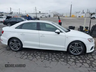 2017 Audi A3 z VIN WAUJ8HFFXH1047739, wystawiony jako IAAI lot #42313056 z przebiegiem 125 104 mil mil oraz . Historia ofert i sprzedaży dostępna na DreamBid. Obrazek 13.