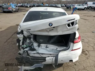 2020 BMW 3 Series M340i xDrive with VIN WBA5U9C04LFH21305, listed as a Copart auction lot 87074524 with 113,784 mi miles and Salvage Title. Bid and sale history available at DreamBid. Image 6.