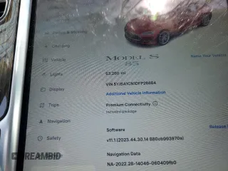 2013 Tesla Model S with VIN 5YJSA1CN1DFP26864, listed as a Copart auction lot 52029485 with 63,260 mi miles and Salvage Title. Bid and sale history available at DreamBid. Image 9.